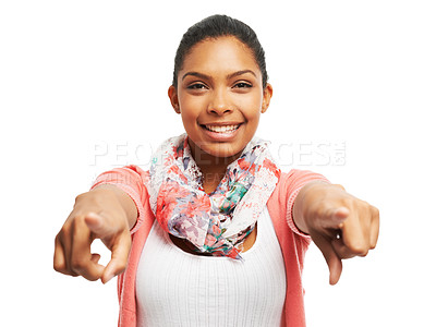 Buy stock photo Smiling young woman pointing at you against a white background