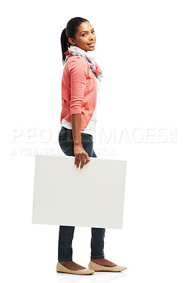 Buy stock photo Casual young woman holding white copyspace against a white background