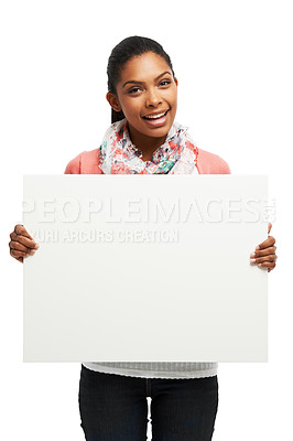 Buy stock photo Casual young woman holding white copyspace against a white background