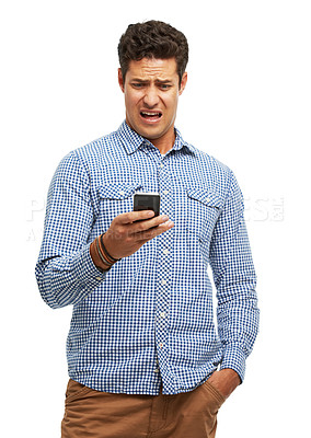 Buy stock photo Phone, shock and man in studio reading post on social media with negative or bad news. Confused, cellphone and male model with wtf, disgust or omg face expression isolated on white background