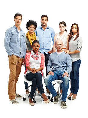 Buy stock photo Group of casually dressed young adults looking serious against a white background