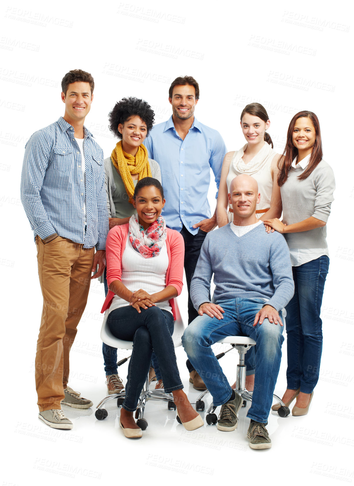 Buy stock photo Smiling group of casual young adults together against a white background