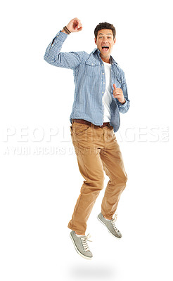 Buy stock photo Handsome young guy jumping energetically against a white background