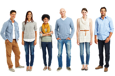 Buy stock photo Casually dressed group of young adults standing against a white background