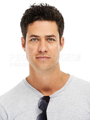 Buy stock photo Handsome young guy looking at the camera while against a white background