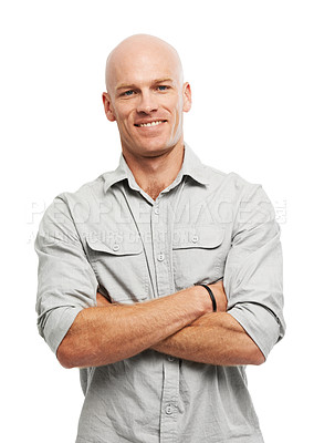 Buy stock photo Portrait of a handsome man standing with his arms crossed