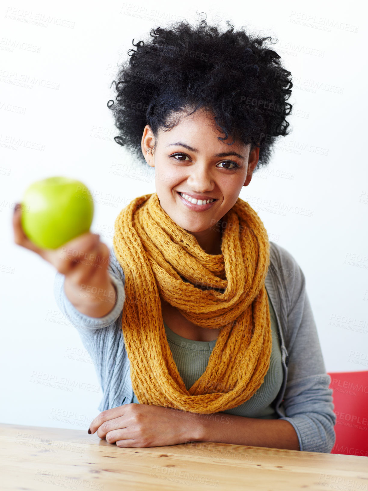 Buy stock photo Happy, giving and portrait of woman with apple for wellness, healthy eating and wellbeing. Food, hand out and person with fruit for organic snack with nutrition, vitamins and detox for vegan diet