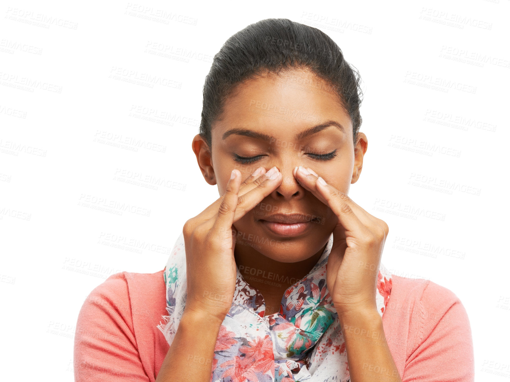 Buy stock photo A pretty young woman battling sinus problems while isolated on a white background