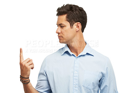 Buy stock photo A handsome young man spinning something on his finger while isolated on white