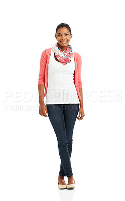 Buy stock photo A full body portrait of a pretty young woman standing with feet crossed against a white background