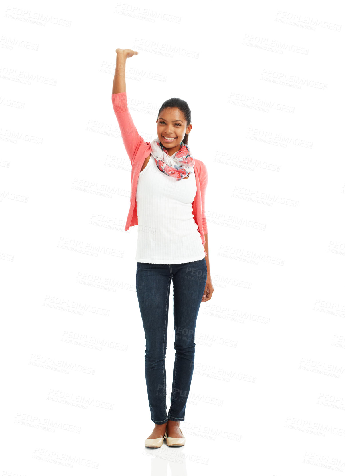 Buy stock photo A full body portrait of a pretty young woman posing with one arm raised against a white background