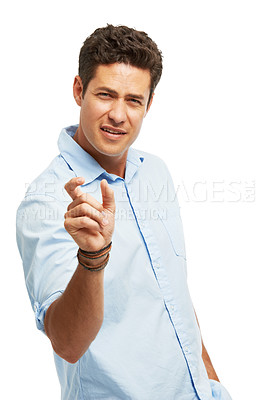 Buy stock photo A handsome young man measuring with his thumb and index finger against a white background