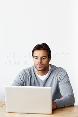 Buy stock photo Laptop, research and business man isolated on white background for startup, career planning or web design ideas. Creative, focus and serious person or online user on computer at desk in studio mockup