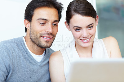 Buy stock photo Business people, laptop and reading with email for good news, communication or social media at office. Businessman, woman or colleagues with smile on computer for online browsing or app at workplace