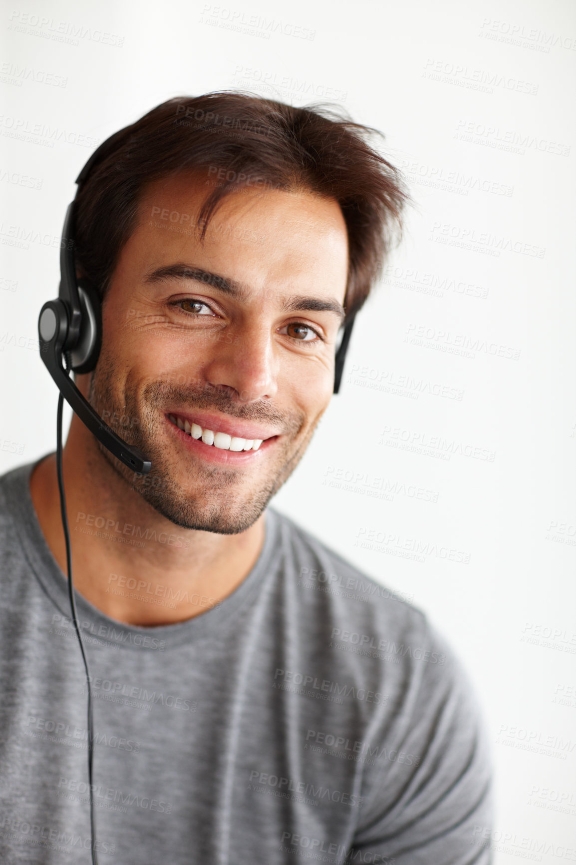 Buy stock photo Portrait, call center and happy man isolated on a white background in virtual communication or technical support. Face of business agent, consultant or sales person for telemarketing career in studio