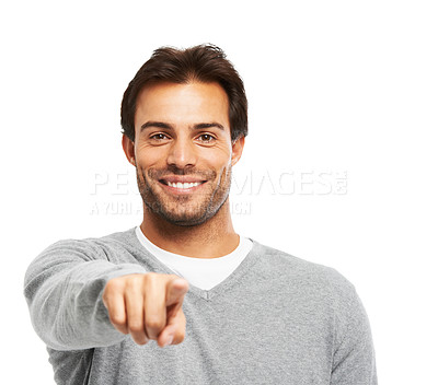 Buy stock photo A handsome young man pointing at you against a white background