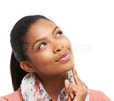 Buy stock photo A gorgeous young woman looking up at copyspace while looking pensive