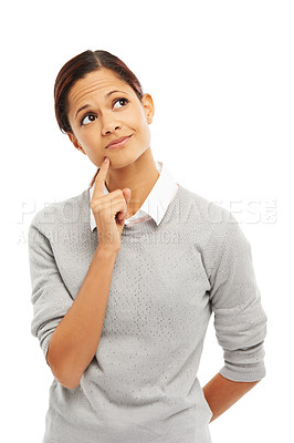 Buy stock photo Studio shot of an attractive young woman thinking with her hand on her chin isolated on white