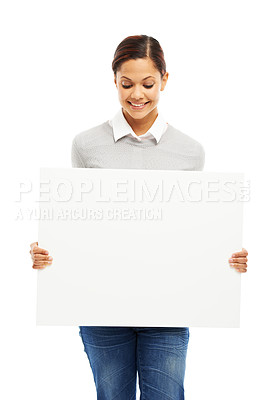 Buy stock photo Woman, employee and happy with poster in studio with white background and mockup space. Female person, sign board and smile with presentation for marketing, promo and advertising with information