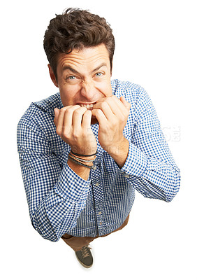 Buy stock photo Man, anxiety portrait and biting nails in studio, mental health disaster and white background. Male person, high angle and nervous for bankruptcy crisis, professional stress and business mistake