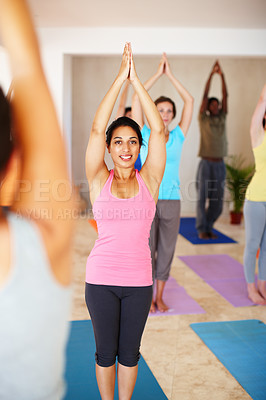 Buy stock photo Fitness, yoga and people in class stretching, exercise and workout on mat for wellness. Pilates, health club and portrait of instructor with men and women for flexibility, balance and healthy body