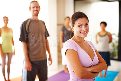 Buy stock photo Portrait, smile and confidence, woman in yoga class for fitness, commitment and body wellness. Pilates, men and women in gym together in holistic health, mindfulness and happy person at exercise club