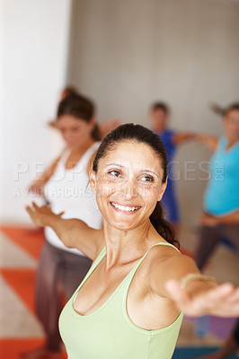 Buy stock photo Fitness, smile and yoga class with an instructor in a studio for health, wellness or holistic training. Exercise, pilates or stretching with a yogi teaching students about zen, balance or inner peace