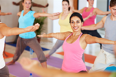Buy stock photo Yoga, stretching and portrait of woman in warrior pose at gym, exercise or healthy body, wellness or pilates. Fitness, happy group or virabhadrasana, balance flexibility or practice in class together