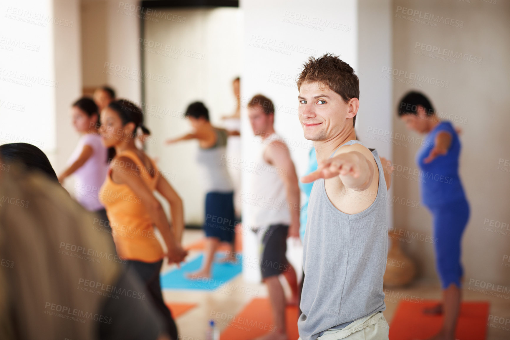 Buy stock photo Yoga, zen and portrait of man in class with exercise for peace, calm or mindfulness with wellness. Fitness, health and person stretching body for movement in pilates workout session at yogi studio.