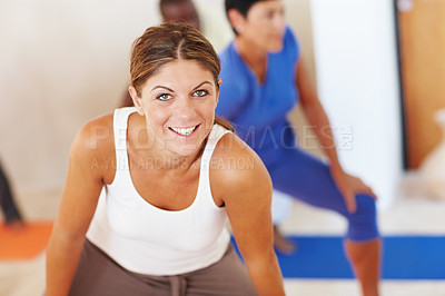 Buy stock photo Woman, portrait and instructor at yoga class, exercise and gym for pilates in stretching position. Female person, yogi teacher and coach for peace at studio, support people and trainer for fitness