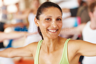 Buy stock photo Woman, portrait and instructor at yoga class, fitness and group for meditation in warrior position. Female person, yogi teacher and coach for mindfulness at studio, support and trainer for peace