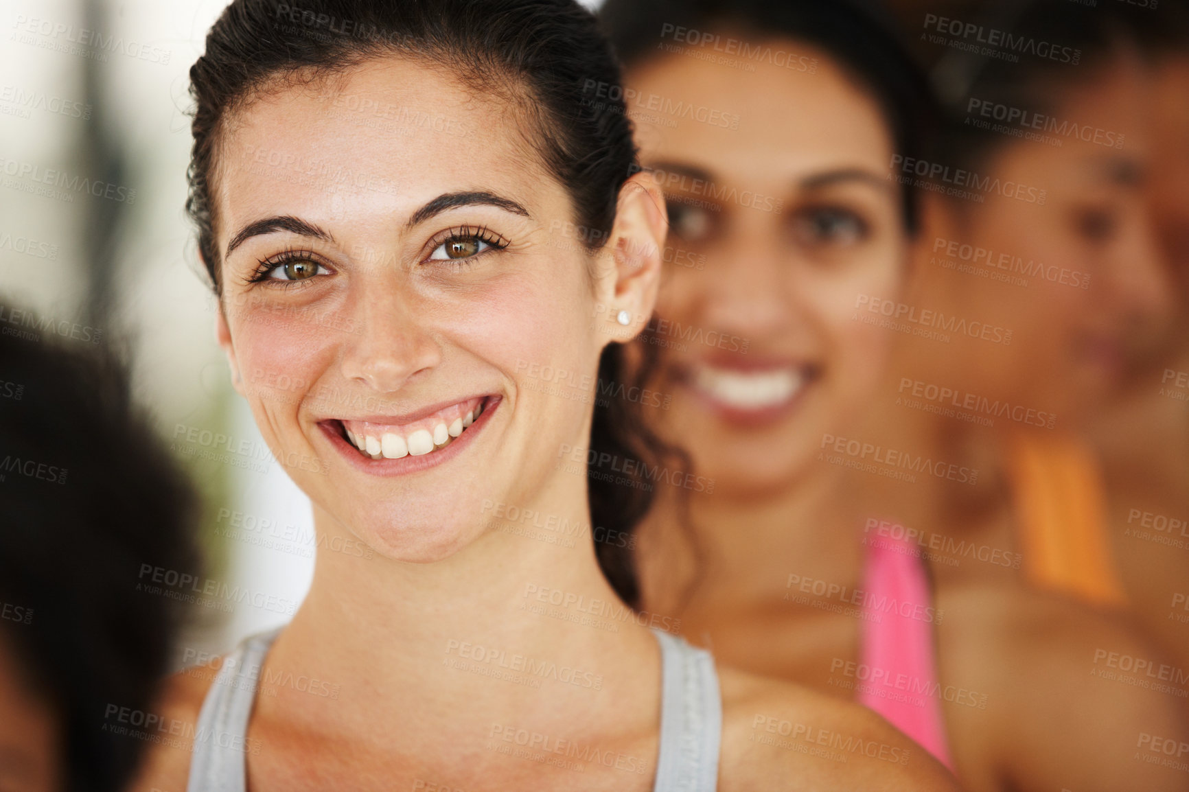 Buy stock photo Girl, yoga class and smile in portrait with group for start to lesson for health, pilates and diversity at gym. Woman, people and happy for learning, fitness and ready with connection in Portugal