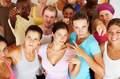 Buy stock photo Portrait of a a group of yoga enthusiasts standing in a yoga studio