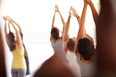 Buy stock photo Yoga, stretching and group of people in class for wellness, health and workout for mobility. Studio, gym and men and women for exercise, training and fitness for pilates, balance and flexibility