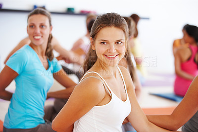 Buy stock photo Yoga, class and happy woman with smile and stretching for health, wellness and flexibility in pilates studio. Relax, student and group at seminar and workshop for calm and balance learning at gym