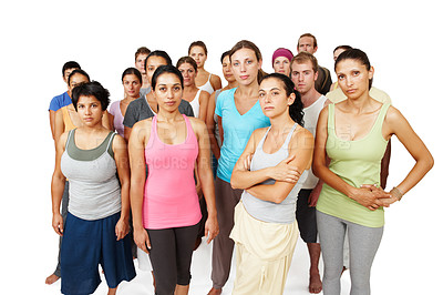 Buy stock photo Portrait, group of people in studio for yoga and fitness with serious face, commitment and wellness. Pilates team, men and women in class together, community of holistic health on white background.