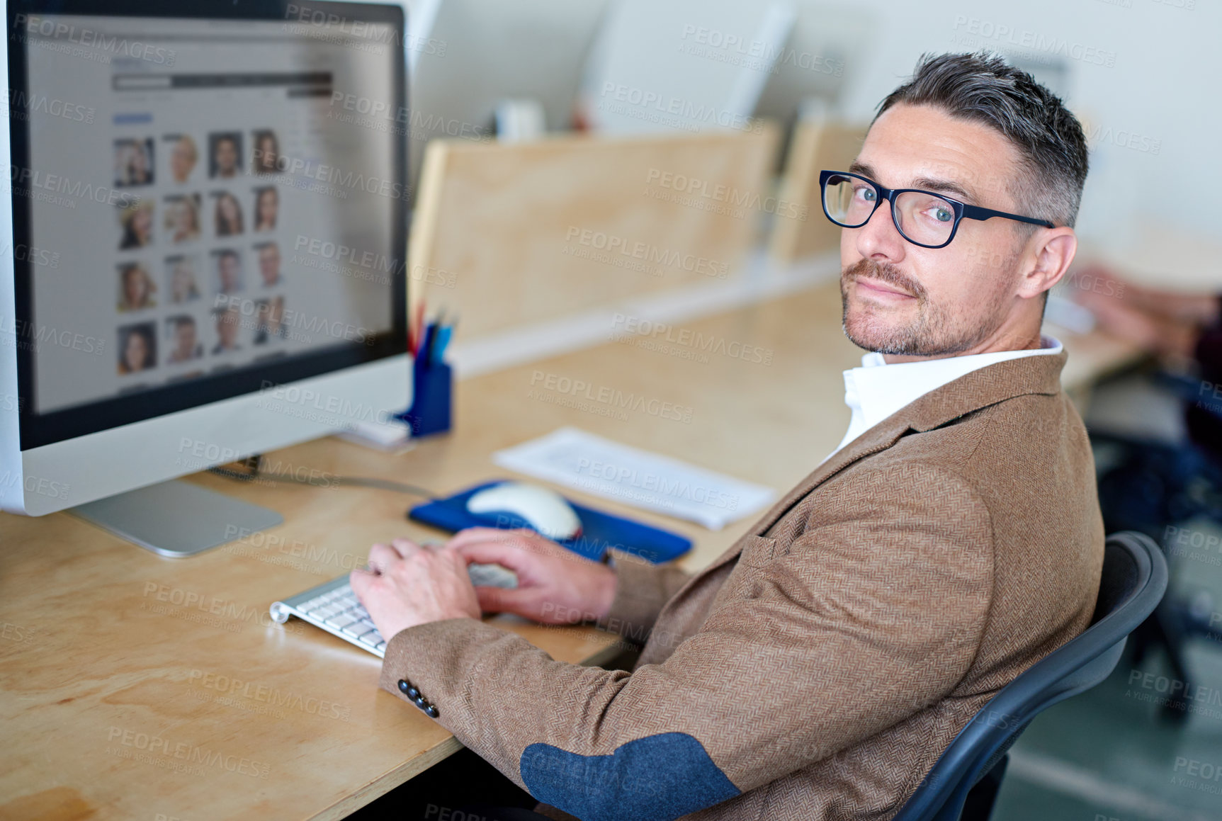 Buy stock photo Shot of a designer at work in an office