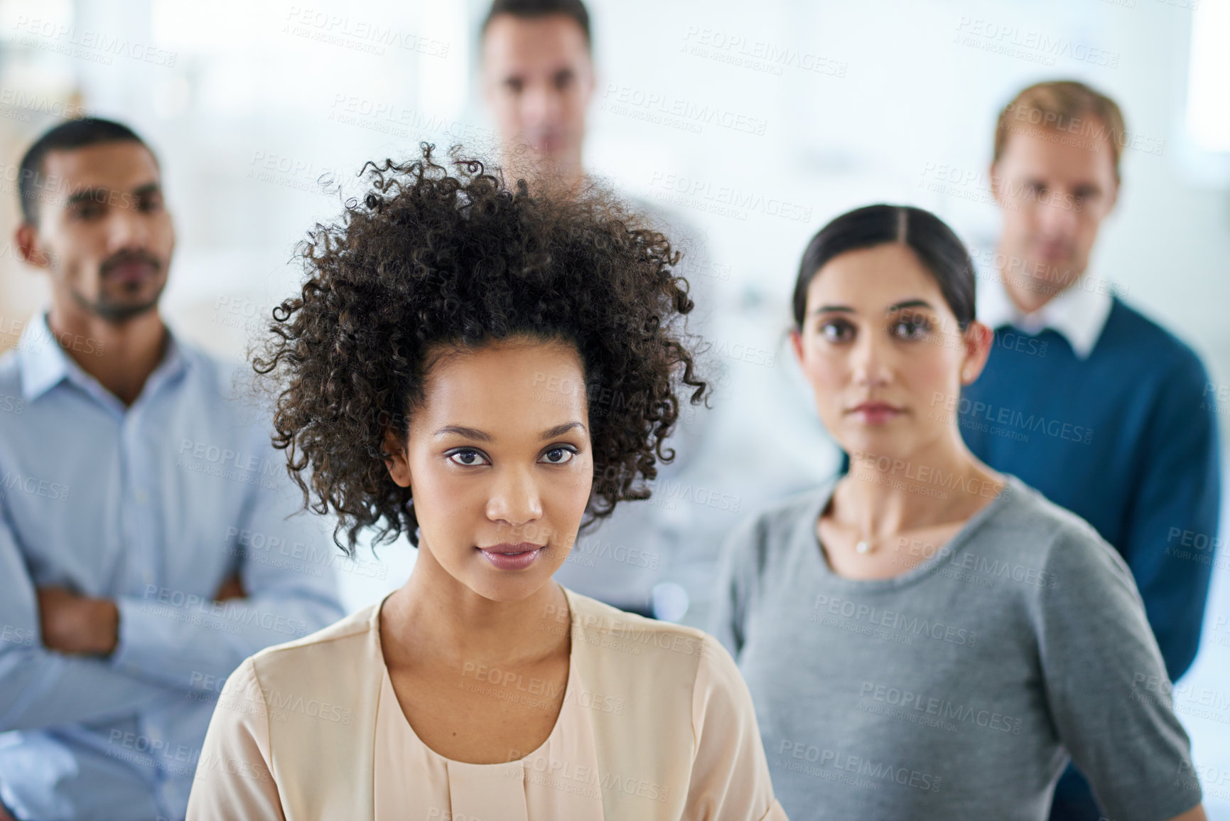 Buy stock photo Portrait of a group of diverse colleagues standing in an office