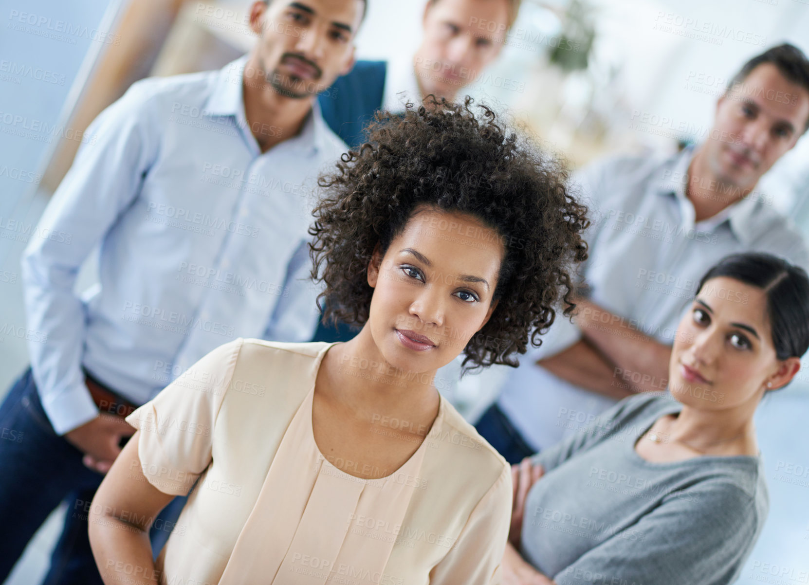 Buy stock photo Portrait of a group of diverse colleagues standing in an office