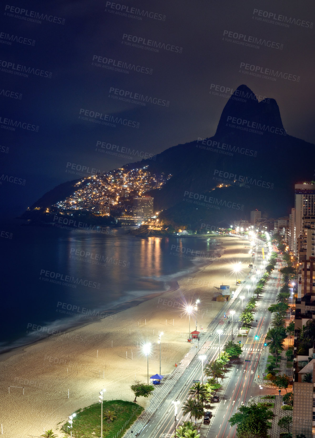 Buy stock photo Shot of a Rio beach at night