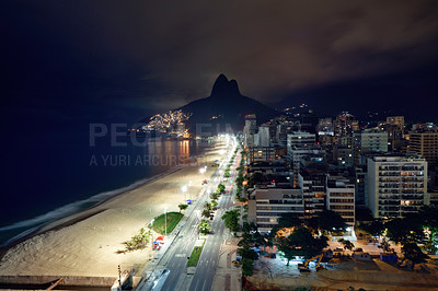 Buy stock photo Shot of a Rio beach at night