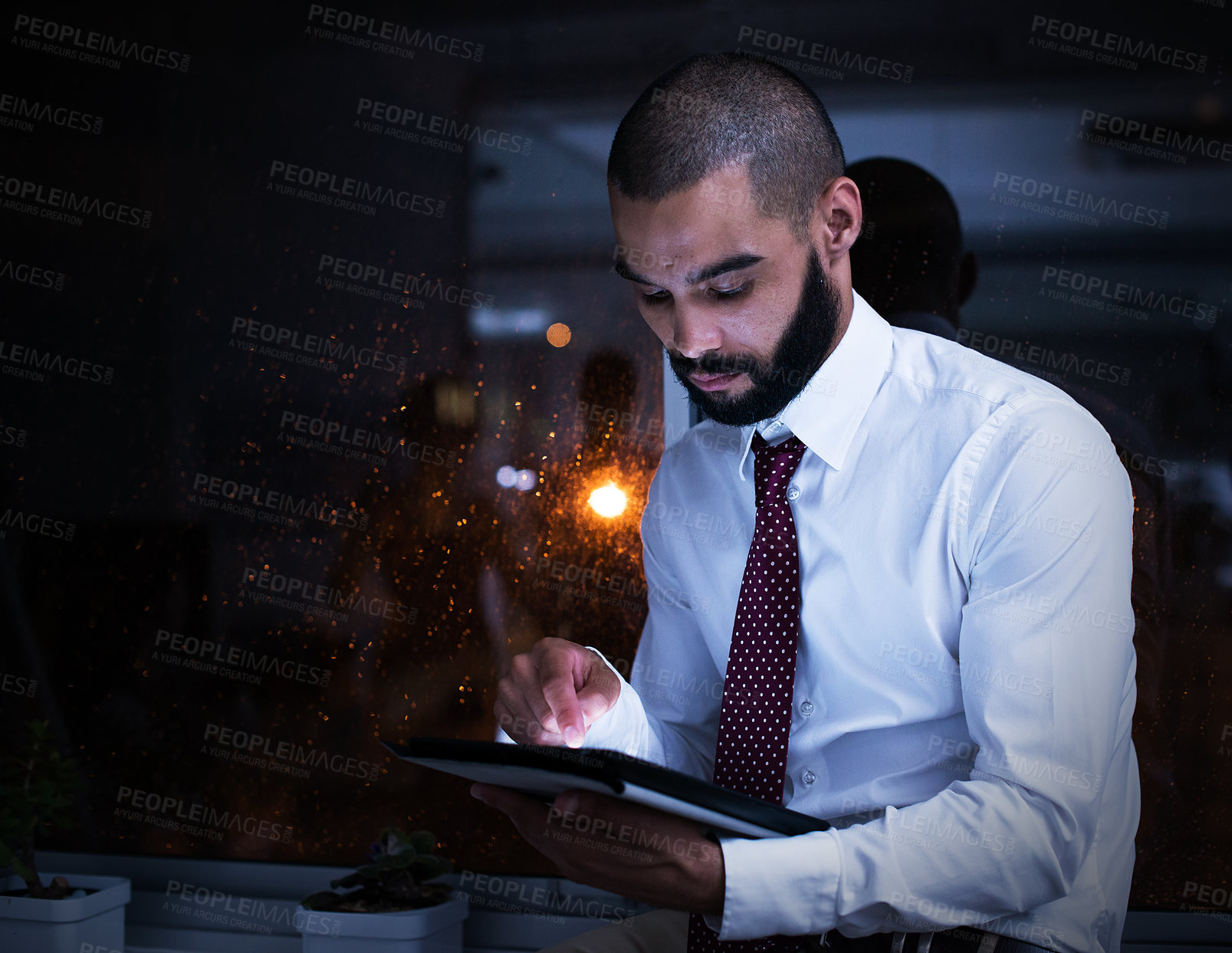 Buy stock photo Working, businessman and tablet in office at night for strategy, research and planning corporate growth. Male professional, reading and emailing on digital device for job, company or connectivity 