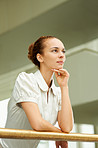 Ambitious businesswoman looking away in thought