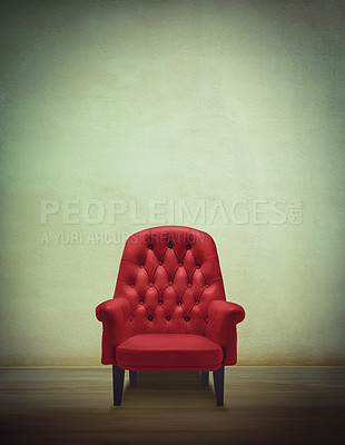 Buy stock photo Shot of a red chair in an otherwse empty room