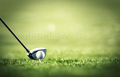 Buy stock photo A golf club ready to tee-off with a white ball on a golf course