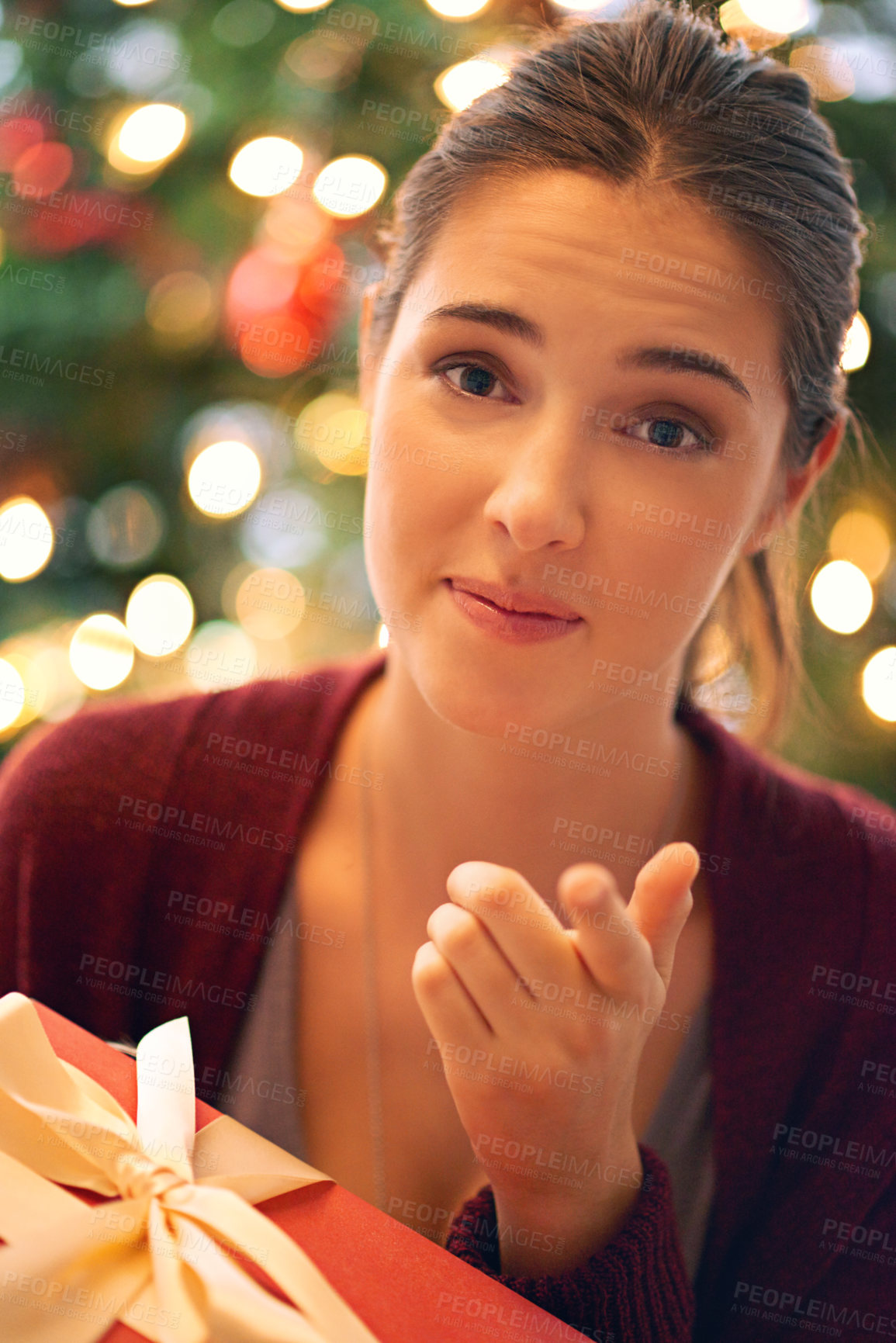 Buy stock photo Christmas, gift and woman pointing at choice or person to give present for Christian religion holiday celebration with a Christmas tree. Portrait of female at home with giftbox for giving background