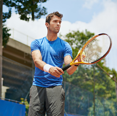 Buy stock photo Man, racket and serve in outdoor tennis match, game and court for competition or practice. Male person, athlete and ready for training or exercise, workout and hobby for action and play fitness