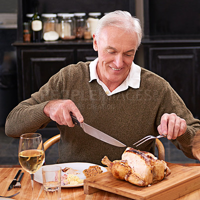 Buy stock photo Old man, home and roast chicken with knife, dinner and eating with healthy meal, delicious and tasty. Pensioner, apartment and senior person with wine, food and meat with alcohol, cutting and hunger