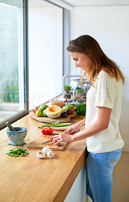 Buy stock photo Smile, home and woman with vegetables, cutting and salad with organic ingredients, healthy meal and food. Wellness, vegetarian and person in kitchen, nutrition and diet with knife, cooking and chef