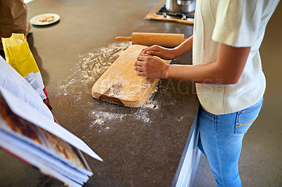 Buy stock photo Woman, hands and baking with flour on board in kitchen for new recipe, cookbook or lesson at home. Closeup of female person, chef or baker kneading dough for pastry, cooking or ingredients at house